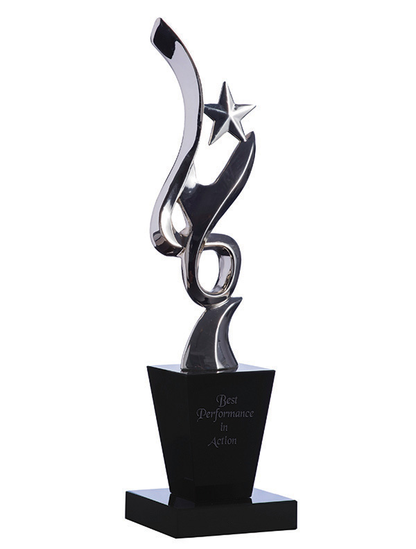 Silver figurine on black crystal base