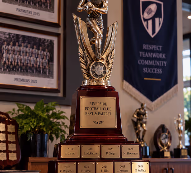 Riverside Football Club perpetual trophy with engraved winner plates across multiple seasons